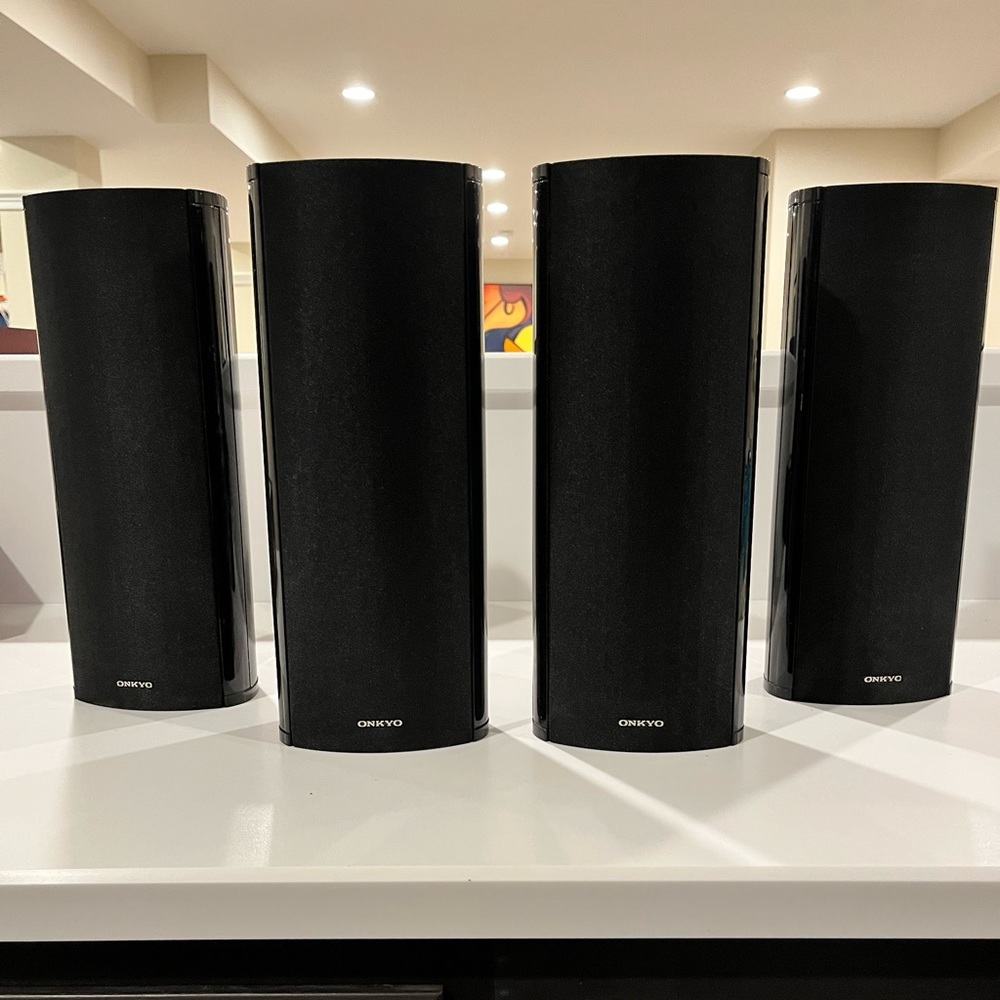 Onkyo home theater speakers. L and R surround. L and R surround back speakers